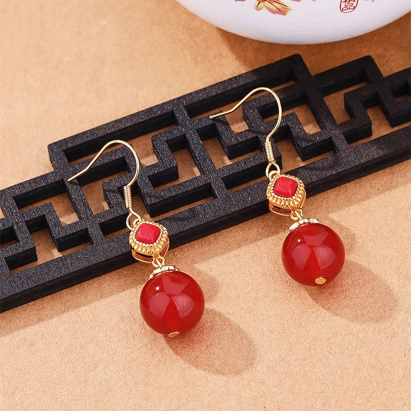 Southern Red Agate round bead earrings with S925 silver geometric inlay on copper alloy frame