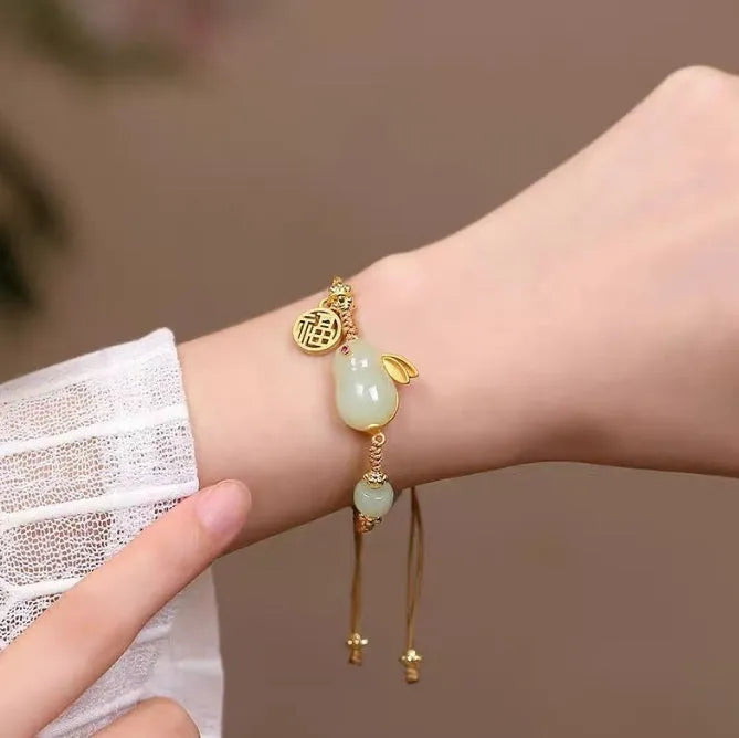 Hetian jade rabbit bracelet for women with geometric charm on yellow adjustable string