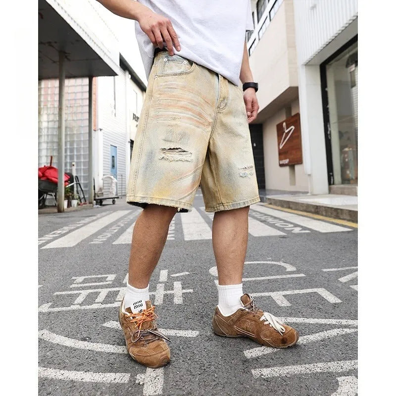 Light blue men's denim shorts with distressed wash and straight-leg silhouette