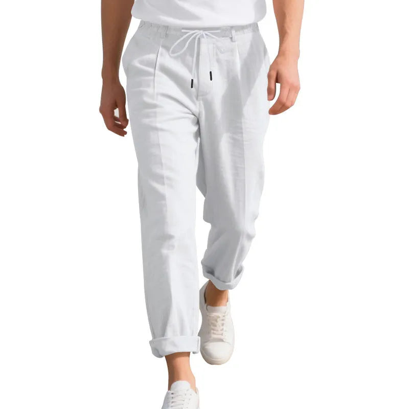 Men's light khaki linen casual trousers with a drawstring waist and straight-leg fit on a hanger.