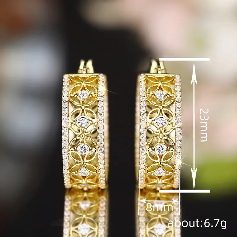 Yellow gold geometric horse eye ear clips with floral butterfly design for women