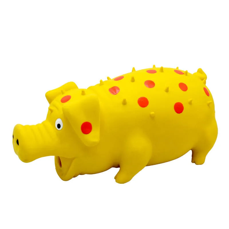 Latex pig-shaped dog chew toy with protruding grain texture in assorted colours