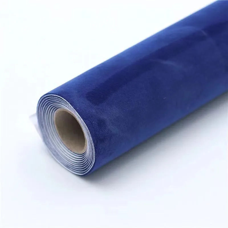 A sheet of self-adhesive black leather suede material with a ruler showing its 0.5mm thickness.