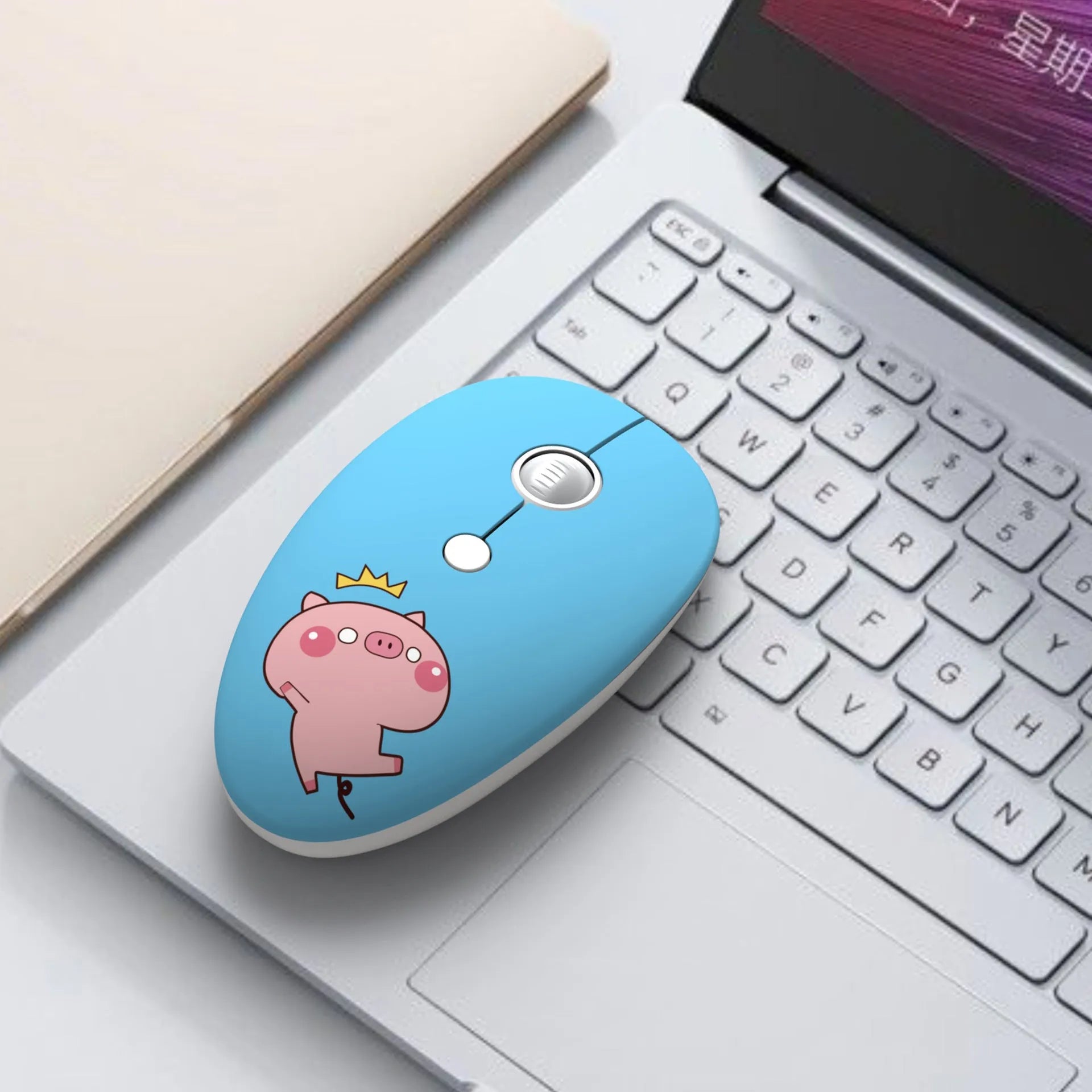 A compact wireless USB mouse for laptops shown in a blue rabbit character design.