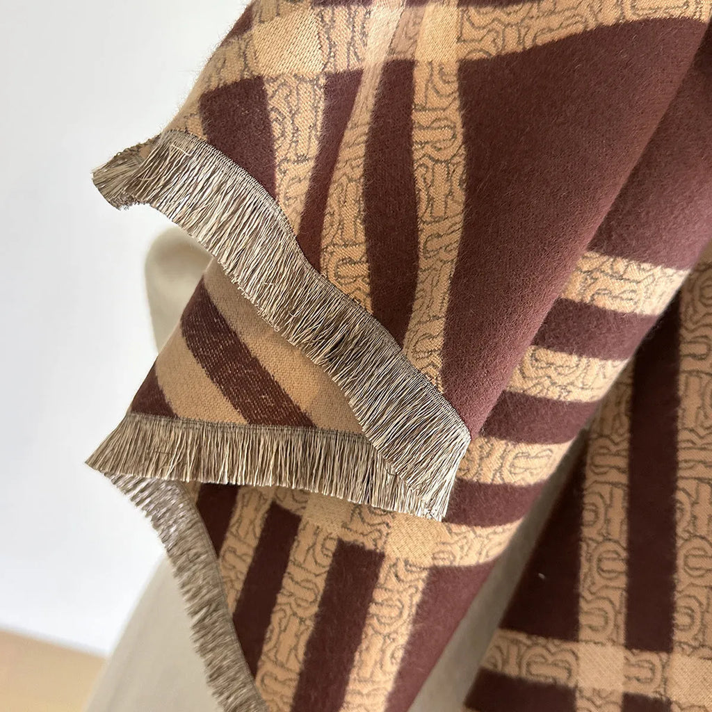 Long brown imitation cashmere scarf with tassel ends laid flat showing 185cm length