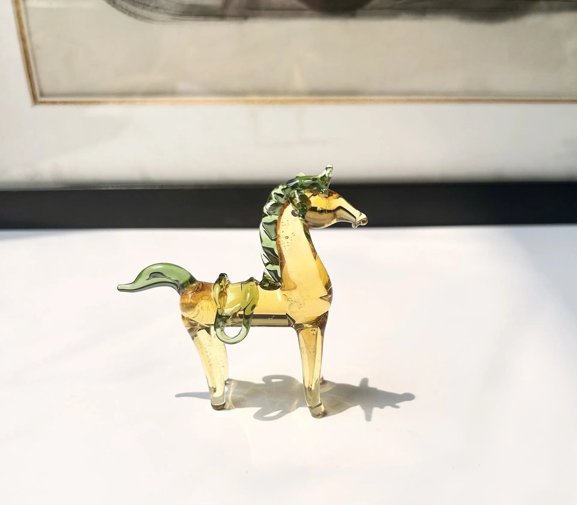 Brown glazed horse sculpture minimalist office decoration on wooden desk