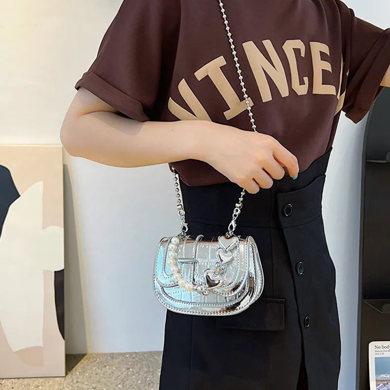 Women's silver PU leather mini tote saddle crossbody bag with single strap and outer pocket