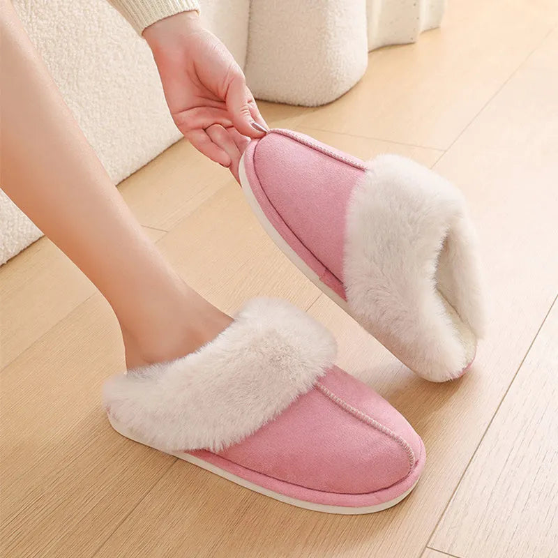Women's brown plush indoor slippers with artificial wool lining and a textured PVC sole.
