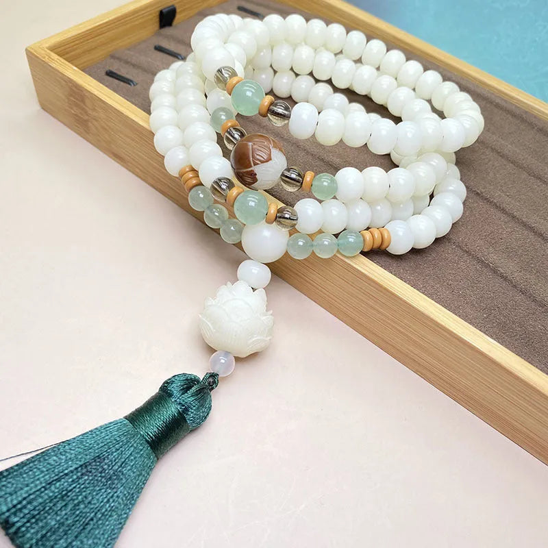 White Jade Bodhi bracelet with 108 beads showing three different style pattern options