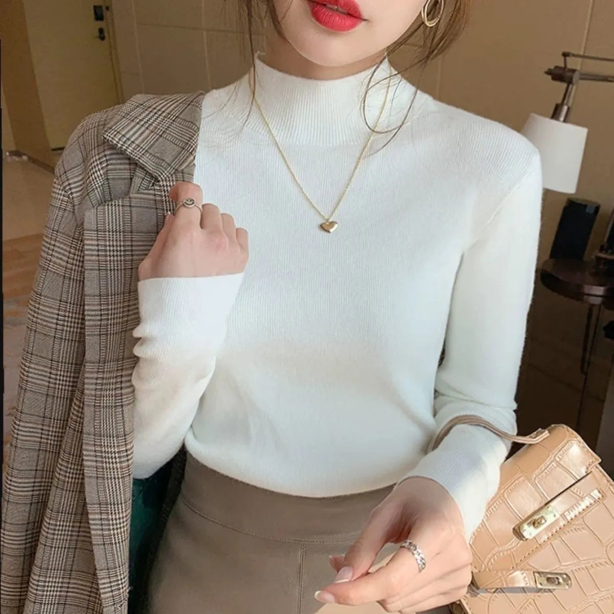 Slim fit long sleeve knitted top in viscose fibre available in multiple colours with Western style design