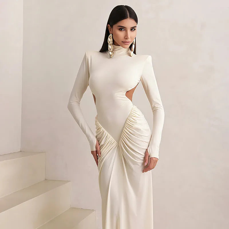 Women's long sleeve backless dress with high collar and pleated detailing in slim fit silhouette