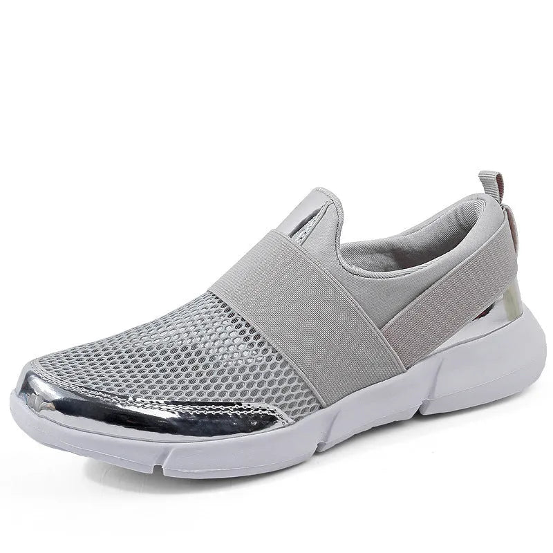 Blue, black, and grey women's low-top sneakers with a mesh lining and lightweight design.