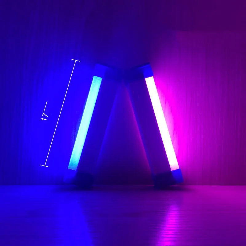 Blue and purple rechargeable LED tube light stick with dimmable RGB settings for photography and room ambience.