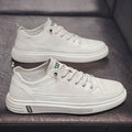 Men's white casual flat shoes with round toe and low heel for summer wear