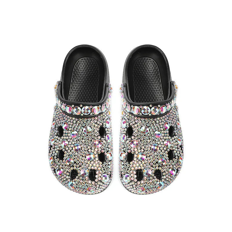 Black women's platform sandals with rhinestone decoration and hole shoes design on an EVA sole.