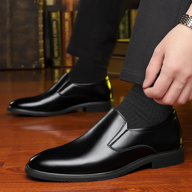 Men's black business casual slip-on shoes with leather toe cap and rubber sole