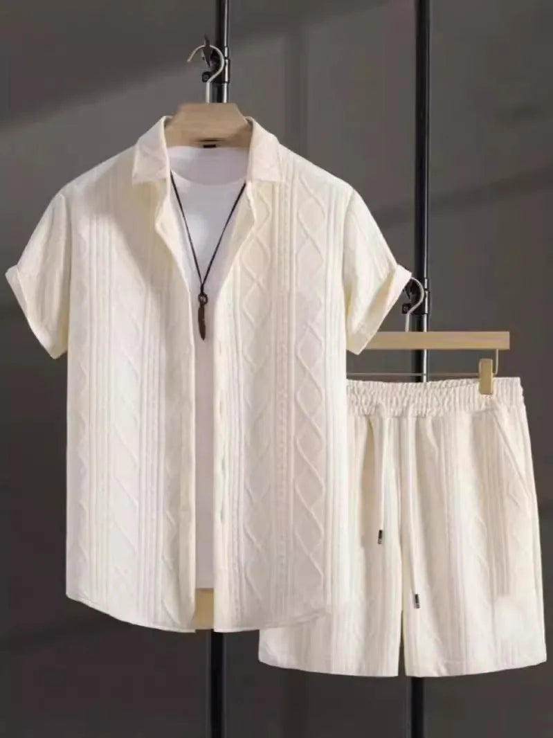 Man wearing a beige short sleeve jacquard suit shirt with matching shorts from a two-piece set.