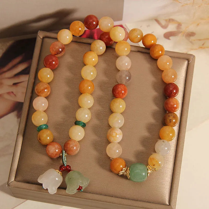 Women's natural jade bracelet with orchid pendant and multi-bead layers