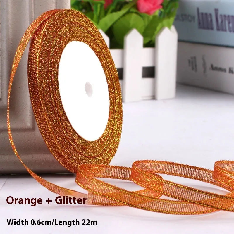 Roll of 0.6cm wide coloured polyester gift ribbon with 22 metre length.