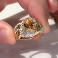 Gold-colour copper feather ring with embossed design and yellow zircon inlay on geometric shape