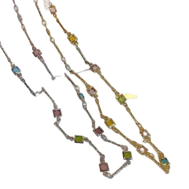 Square geometry clavicle chain necklace with artificial crystal and quadrilateral elements in gold finish