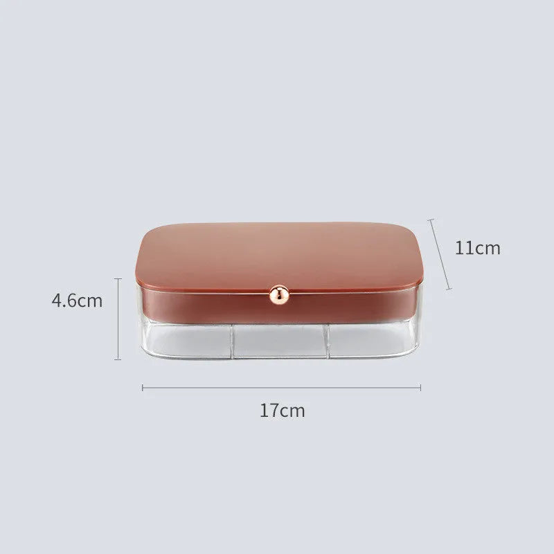 Green minimalist jewelry storage box with multiple layers for organised accessory storage