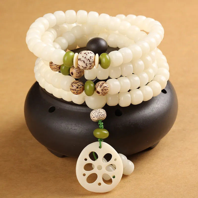 White Jade Bodhi Beads Long Bracelet with 6x8mm beads in multiple style options.