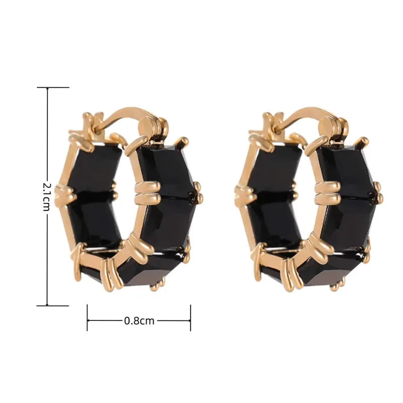 Geometric U-shaped gold earrings with black zircon crystal stones and round decorative elements