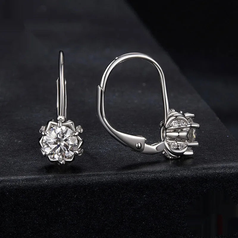 Sterling silver flower bud ear clips with white gold plating and 0.5ct moissanite stone