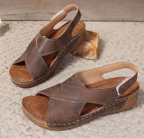 Roman platform sandals with skirt detail and adjustable Velcro strap in khaki colour