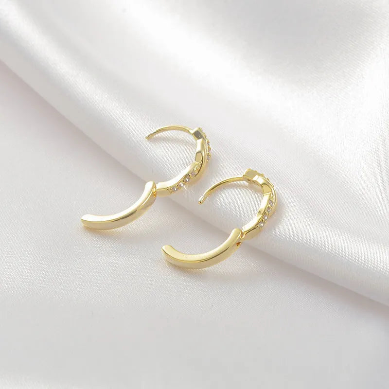 Geometric hemp rope earclip earrings in gold or silver copper with diamond treatment and round elements