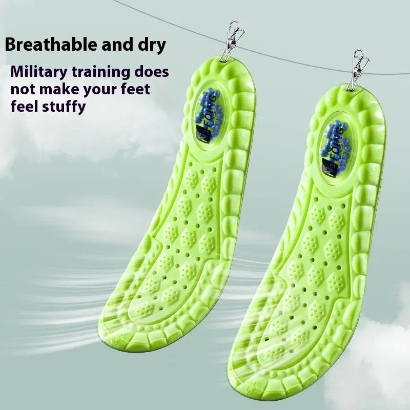 Green PU sports insoles with air cushion shock absorption and argy wormwood infusion on a white background.