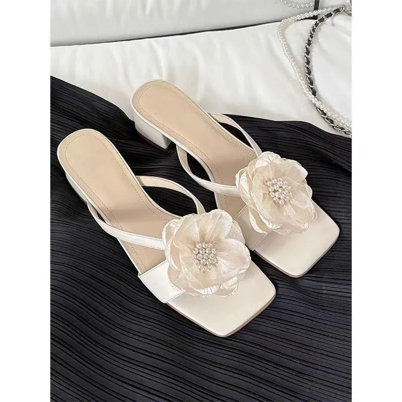 Korean-style women's sandals with chunky heel, square toe, satin upper with floral details in cream-white colour