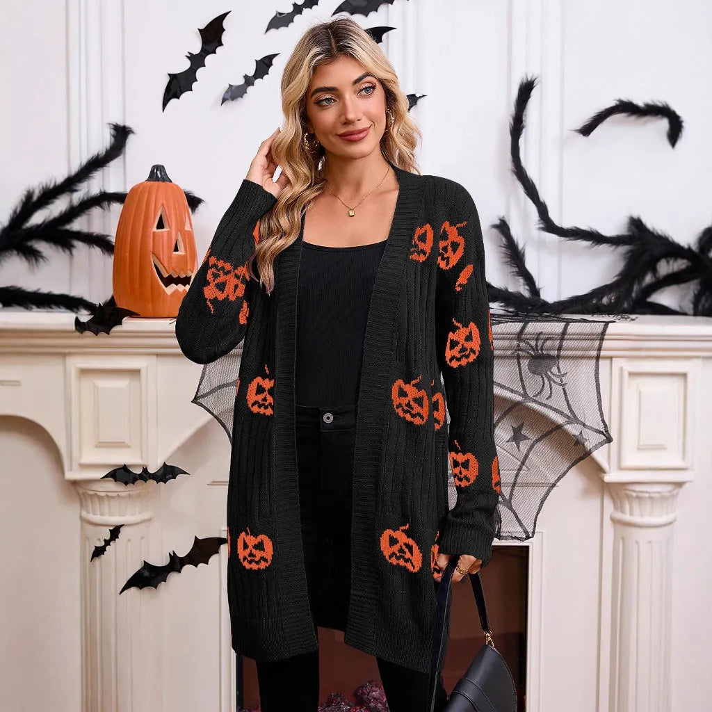 Women's black Halloween cardigan with orange Jacquard pumpkin head pattern on the front.