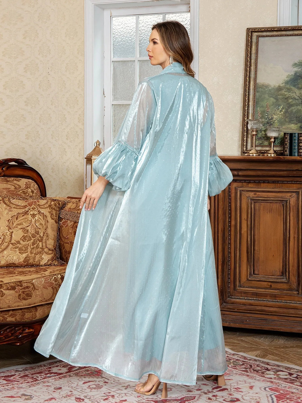 Arabic-style two-piece dress with rhinestone detailing and long sleeves in blue or brown colours
