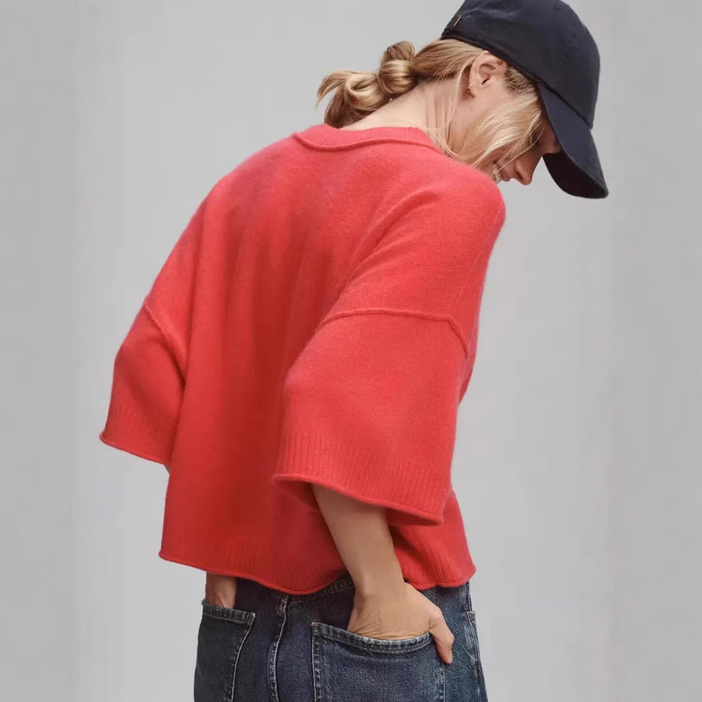 Red short sleeve viscose T-shirt with an exposed navel crop design on a model.