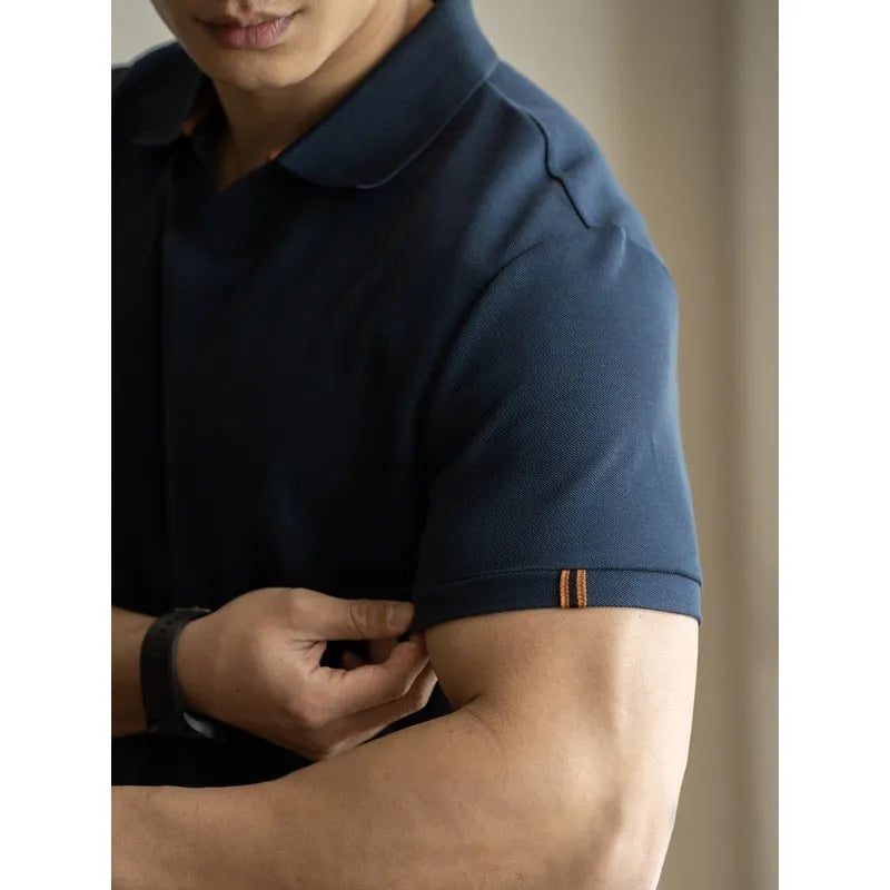 American-style short-sleeve polo shirt in blue, shown on a model.