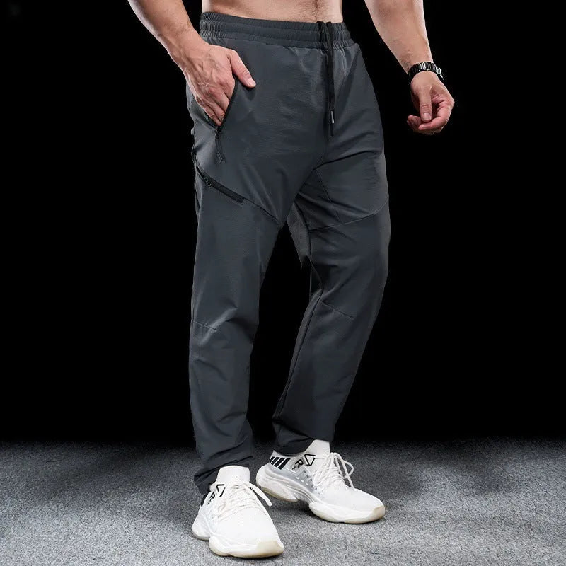 Men's waterproof quick-drying nylon workout trousers in army green for sports and running