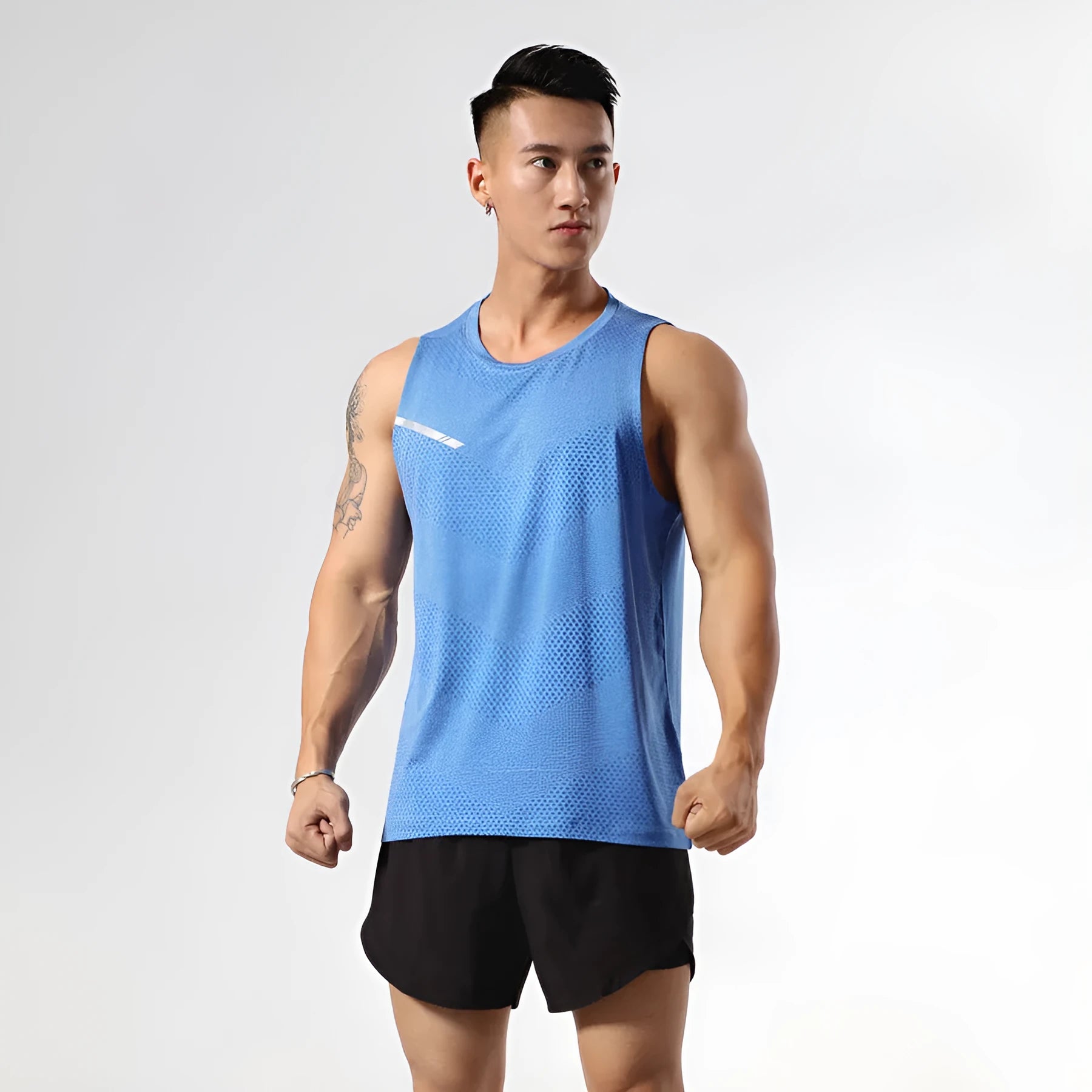Men's solid colour quick-drying sports tank top for summer outdoor activities on a neutral background.