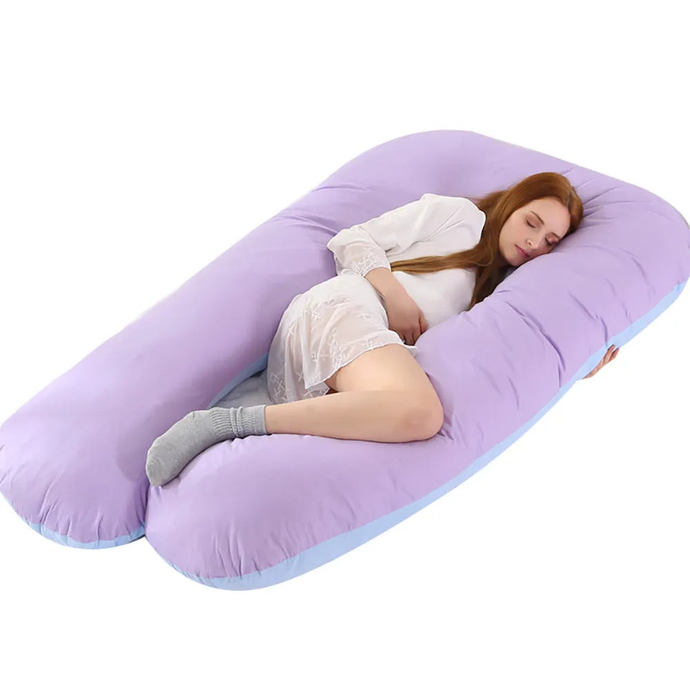 Large U-shaped pregnancy support pillow with removable cover in choice of fabrics.