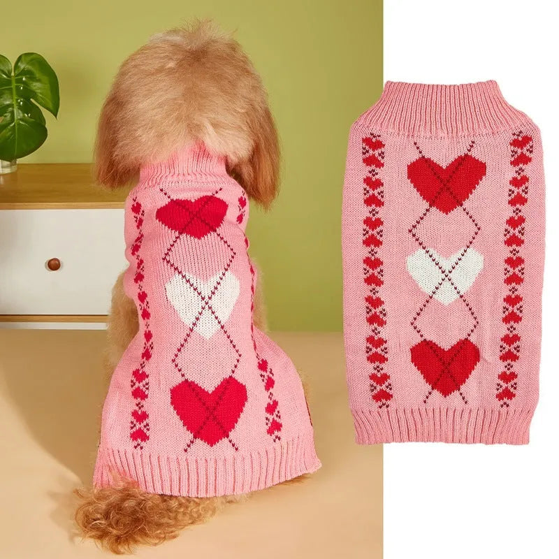 Red love heart design dog sweater on a small dog, showing acrylic knit fabric and playful motif.