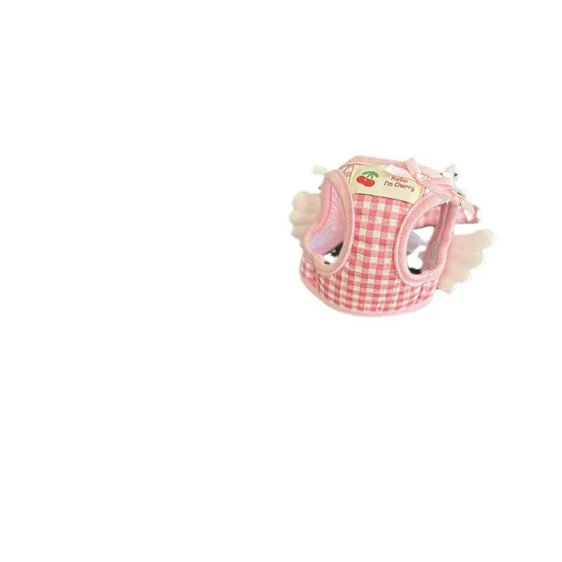 Pink cotton chest-back dog harness with a top handle for a small dog.
