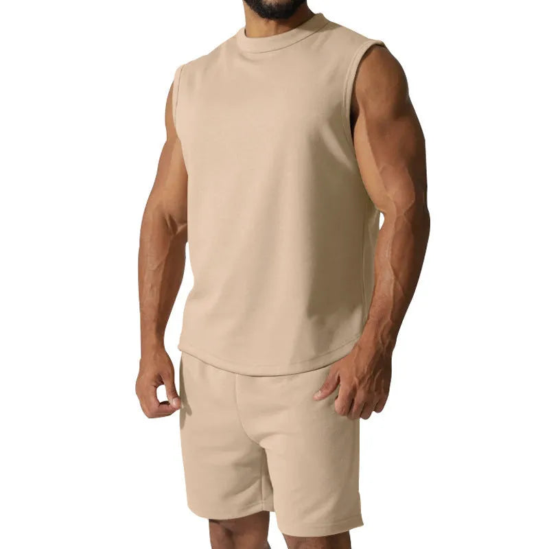 Men's solid colour sleeveless sports top and matching casual shorts set on a hanger