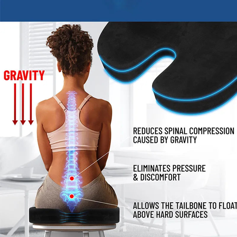 Black memory foam seat cushion with U-shaped design for tailbone relief on office chair