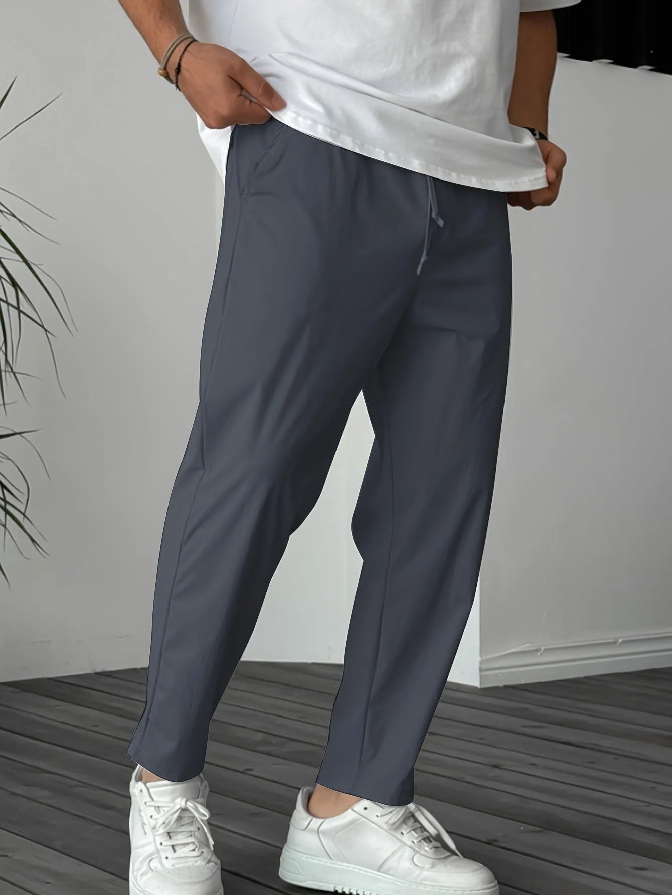Men's khaki bamboo fibre drawstring trousers with straight leg and ribbon pocket