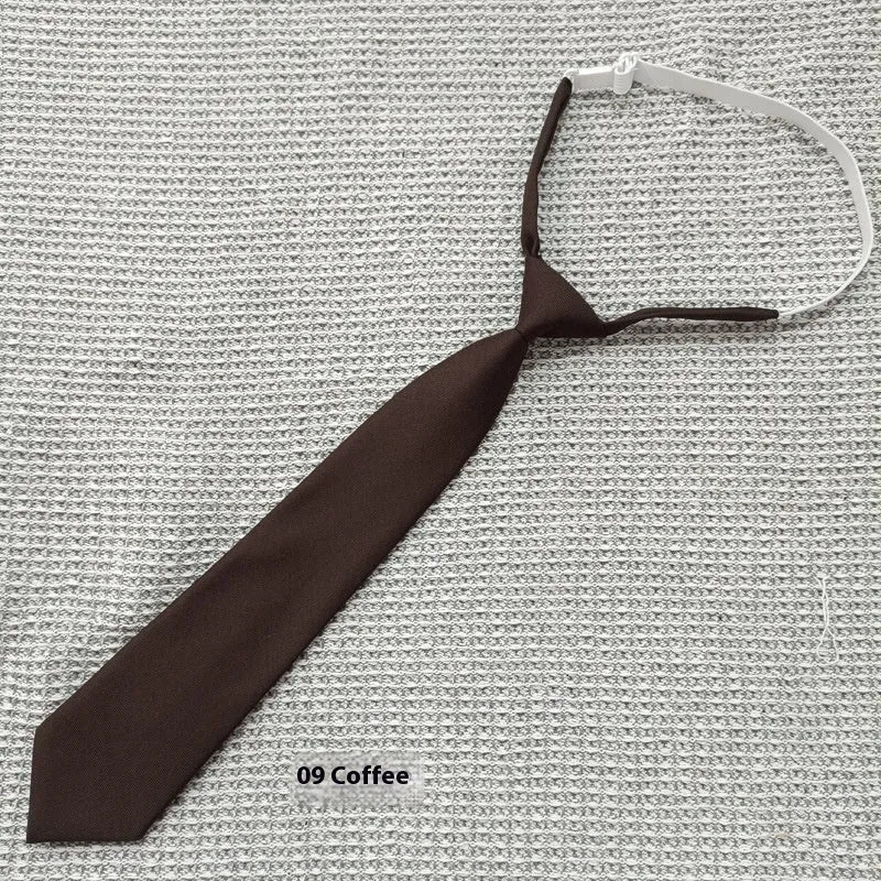 Solid navy blue men's cotton tie with arrow-type design on a white background.