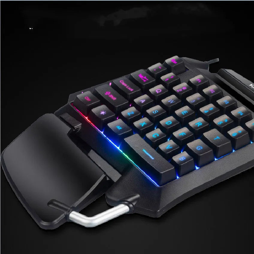 Black left-hand one-handed gaming keyboard throne converter with USB cable and integrated hand rest