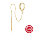 Close-up of a women's S925 sterling silver stud earring with a diamond flower, chain, and tassel design in a gold colour.