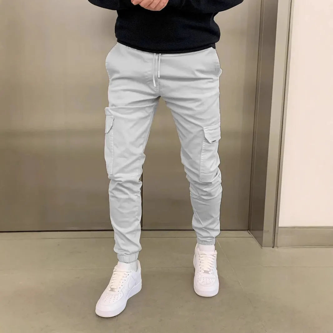 Men's polyester overalls with dimensional patch pockets and elastic waistband in straight leg baggy pants style