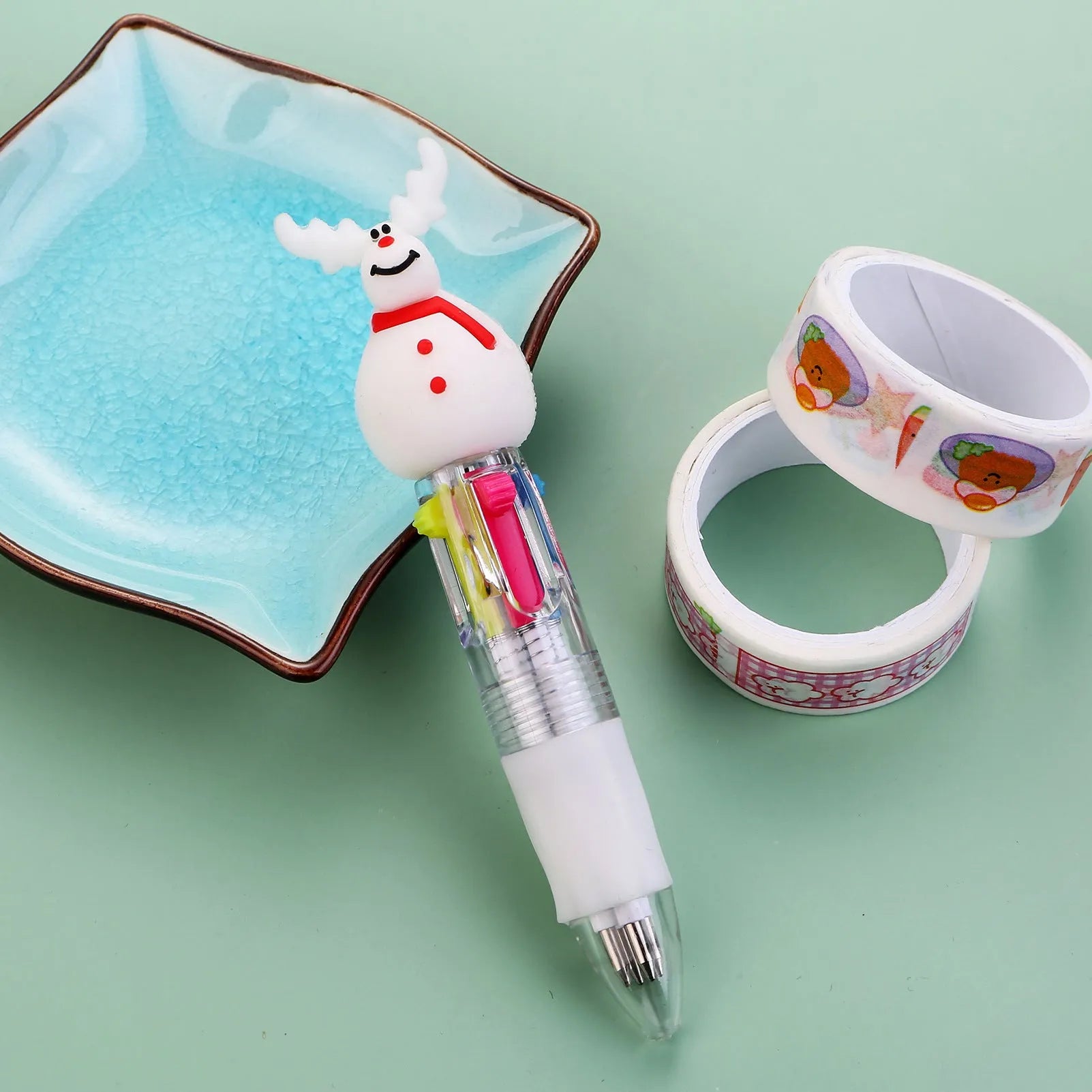 Compact 11cm Christmas four-colour ballpoint pen with press mechanism in festive designs